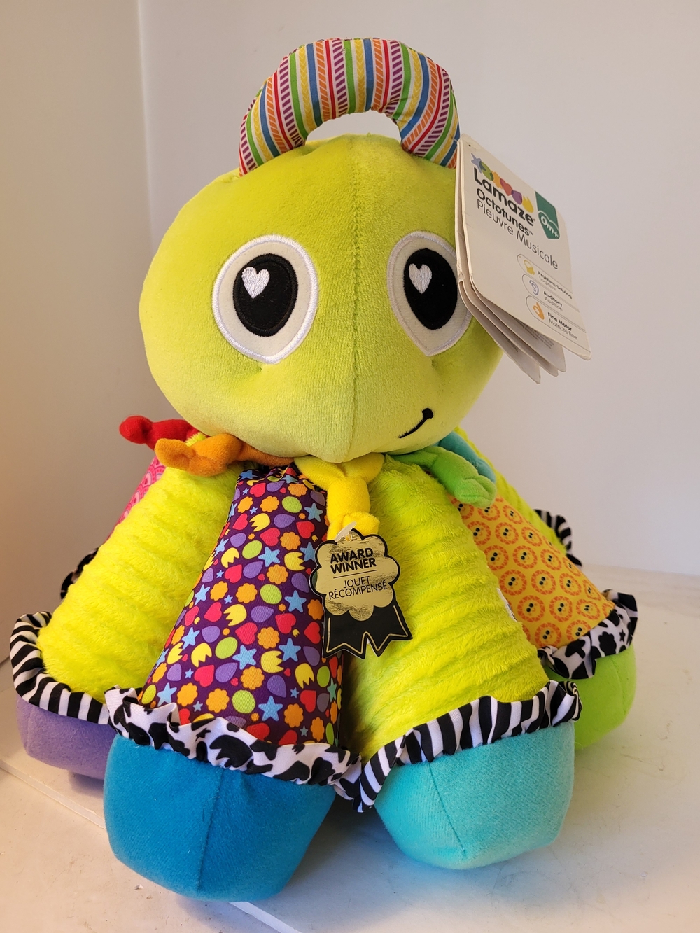 Lamaze Bright Green Musical Octopus Plush Toy - Award Winner